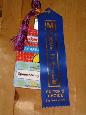 Maker Faire badge and Editor's Choice ribbon
