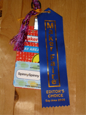 Maker Faire badge and Editor's Choice ribbon