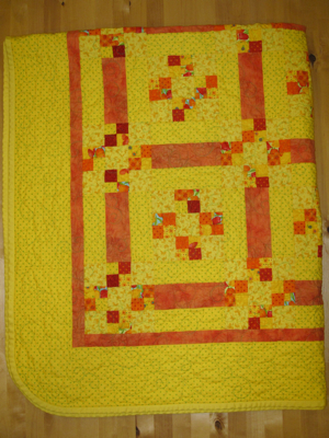 Yellow and orange quilt