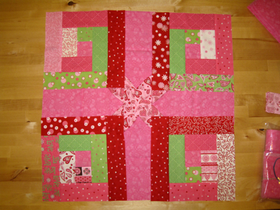 pink log cabin and stars quilt blocks