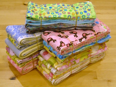 bundles of multicolor strips of fabrics